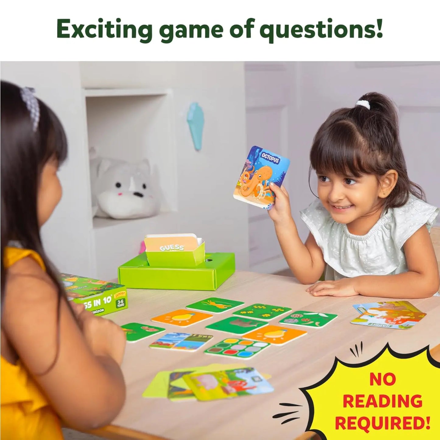 Children playing Guess in 10 Junior Animal Kingdom trivia card game for ages 3 to 6