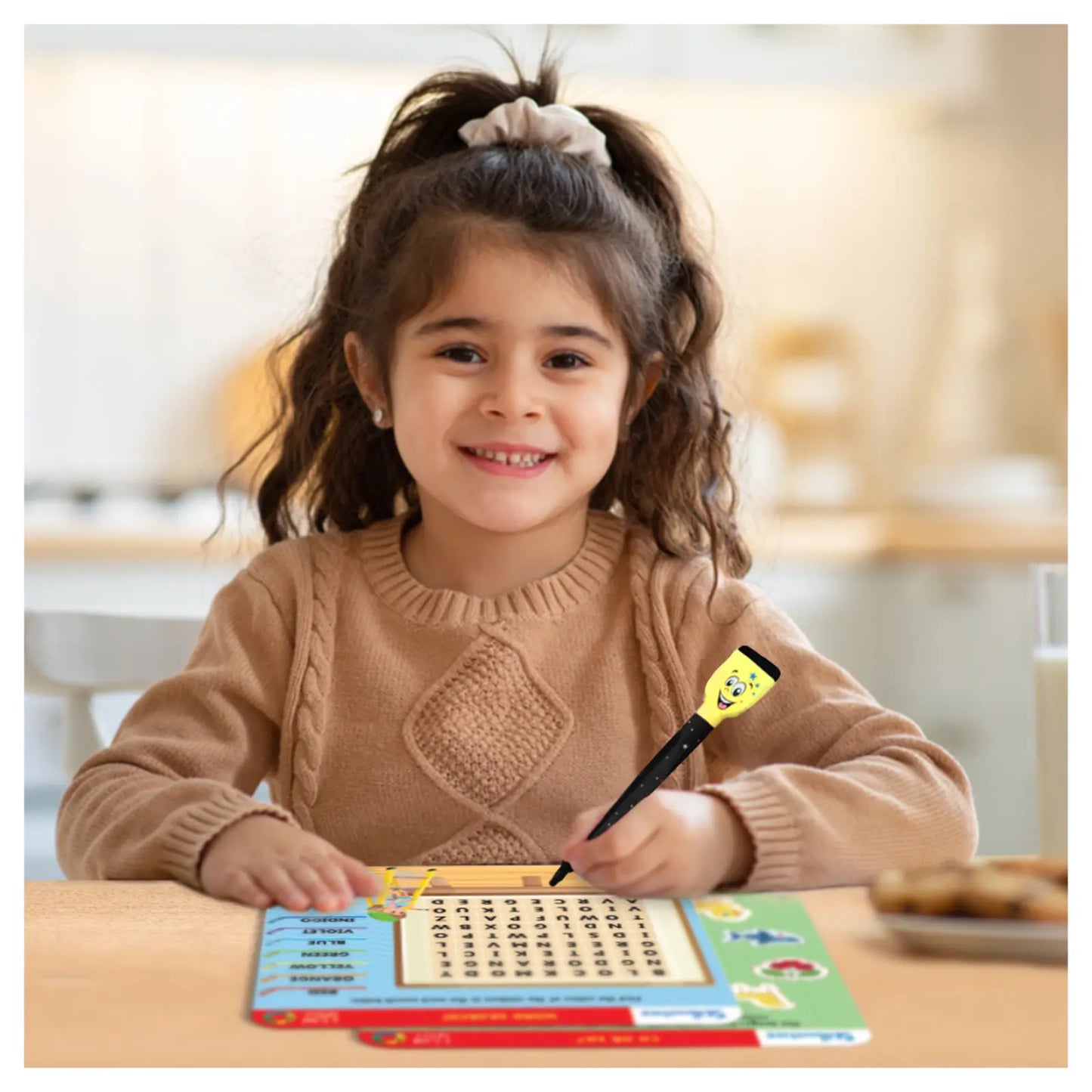 Smiling girl playing with Write and Wipe I Can Spell word search game