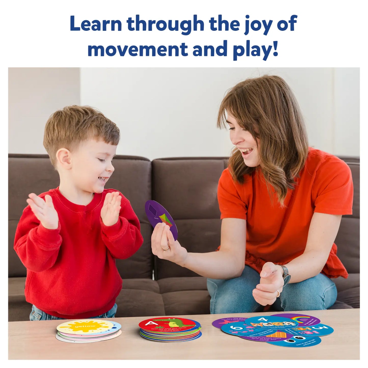 Woman and child playing with colorful educational toys on a table.