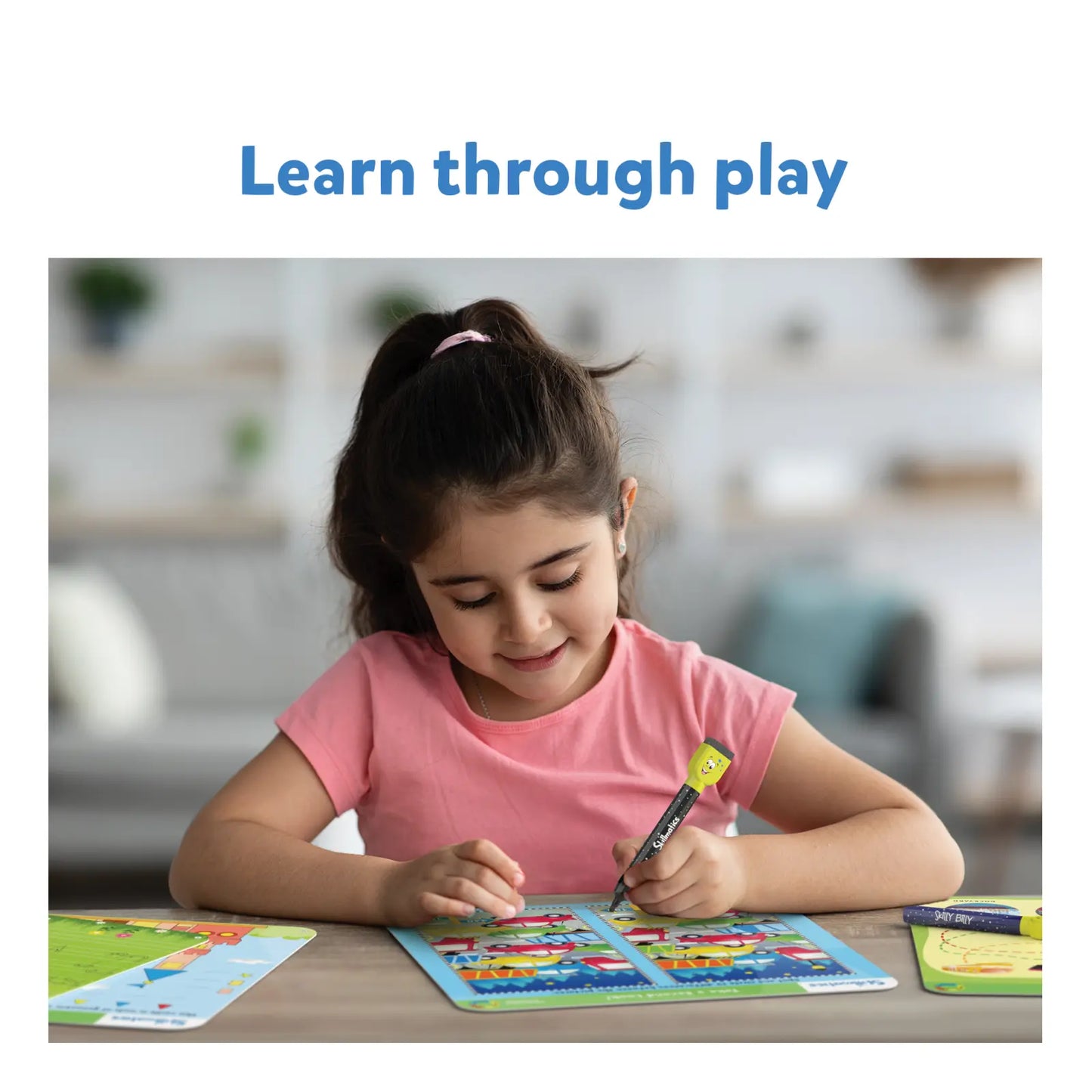 Young girl enjoying creative play with Markers and Game on Write and Wipe Preschool Champion