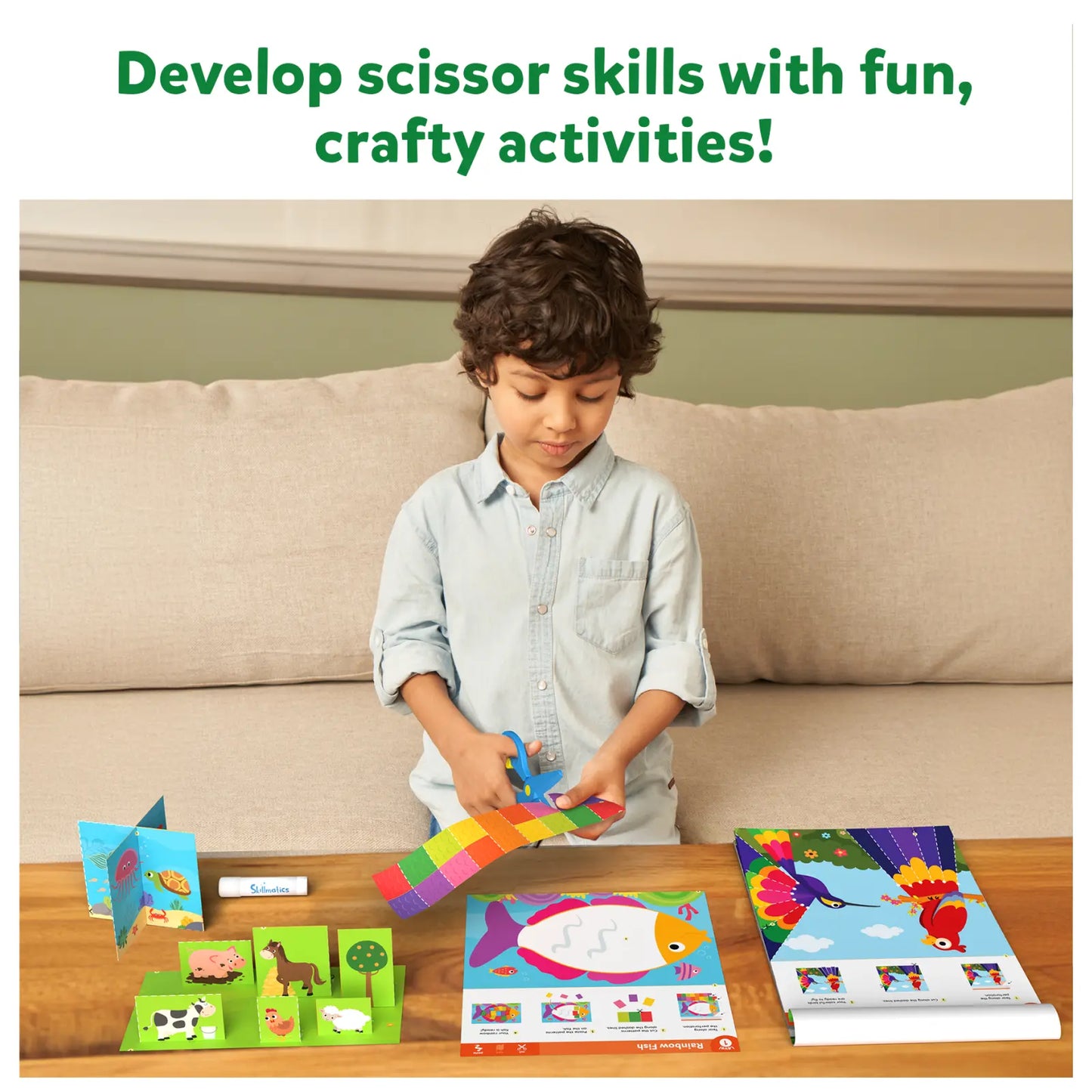 Child cutting colorful paper with Snip Snip Amazing Animals Art & Craft Activity Kit