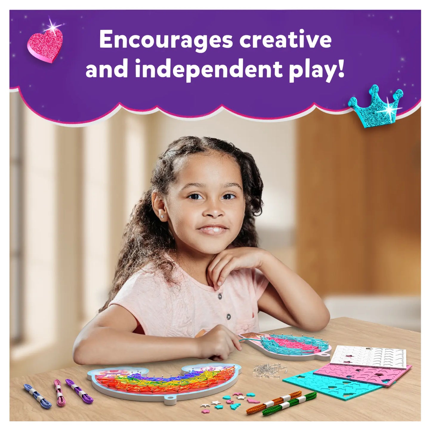 Young girl playing with Super Strings Unicorn Magic craft set for kids ages 6-12