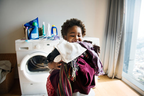 Kid doing chores happily