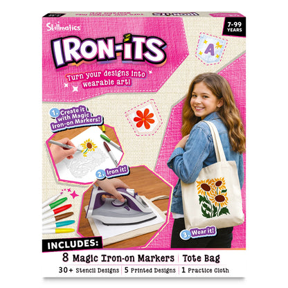 Skillmatics Iron-Its craft kit in pink box. Smiling teen girl holds canvas tote bag with orange tulip art. Three steps shown: create with magic iron-on markers, iron design onto fabric, then wear it. Includes 8 markers, tote bag, 30+ stencils, 5 printed designs, practice cloth. Ages 7–99.