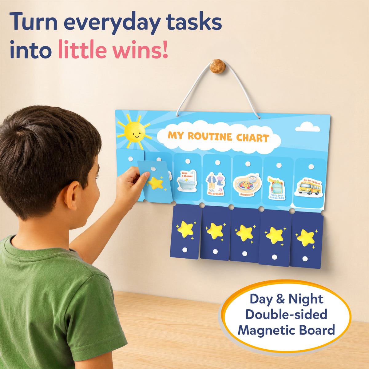 A child places a magnetic task tile onto the Skillmatics My Routine Chart mounted on a wall. The double-sided day and night magnetic board features routine activities, while extra magnetic task pieces are spread across the table to help children build consistent daily habits.