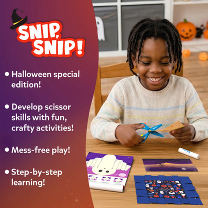 Smiling boy in a striped sweater cutting a Halloween activity sheet with blue safety scissors at a wooden table, with a ghost booklet page, a purple scene, a woven Halloween craft and a glue stick nearby. Text: Halloween special edition, develop scissor skills, mess-free play, step-by-step learning.