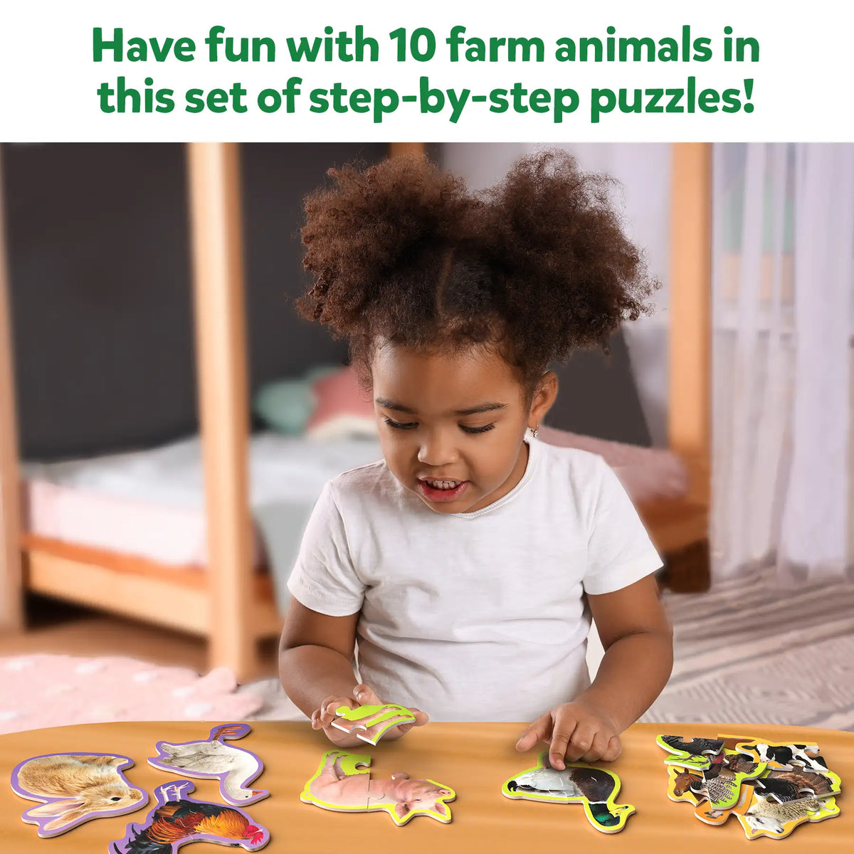 Child playing with farm animal puzzles from Step by Step Puzzle Farm Animals for ages 3+