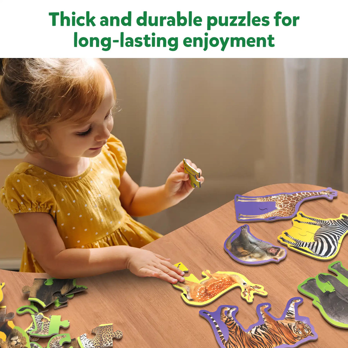 Animal-themed jigsaw puzzle pieces from Step By Step Puzzle Wild Animals for ages 3 plus