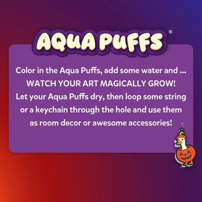 Aqua Puffs logo above a purple text panel reading: Color in the Aqua Puffs, add some water and watch your art magically grow. Let them dry, then loop string or a keychain through the hole to use as room decor or accessories. A puffed goose-in-a-pumpkin ornament hangs in the corner.