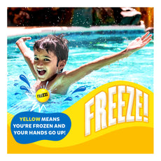 Boy enjoying a colorful pool with Color Hitz product during summer fun