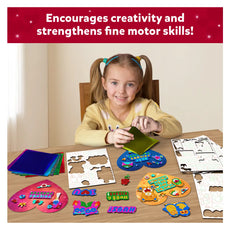 Girl crafting with heart-shaped stickers using Foil Fun Friendship Hearts Art Kit