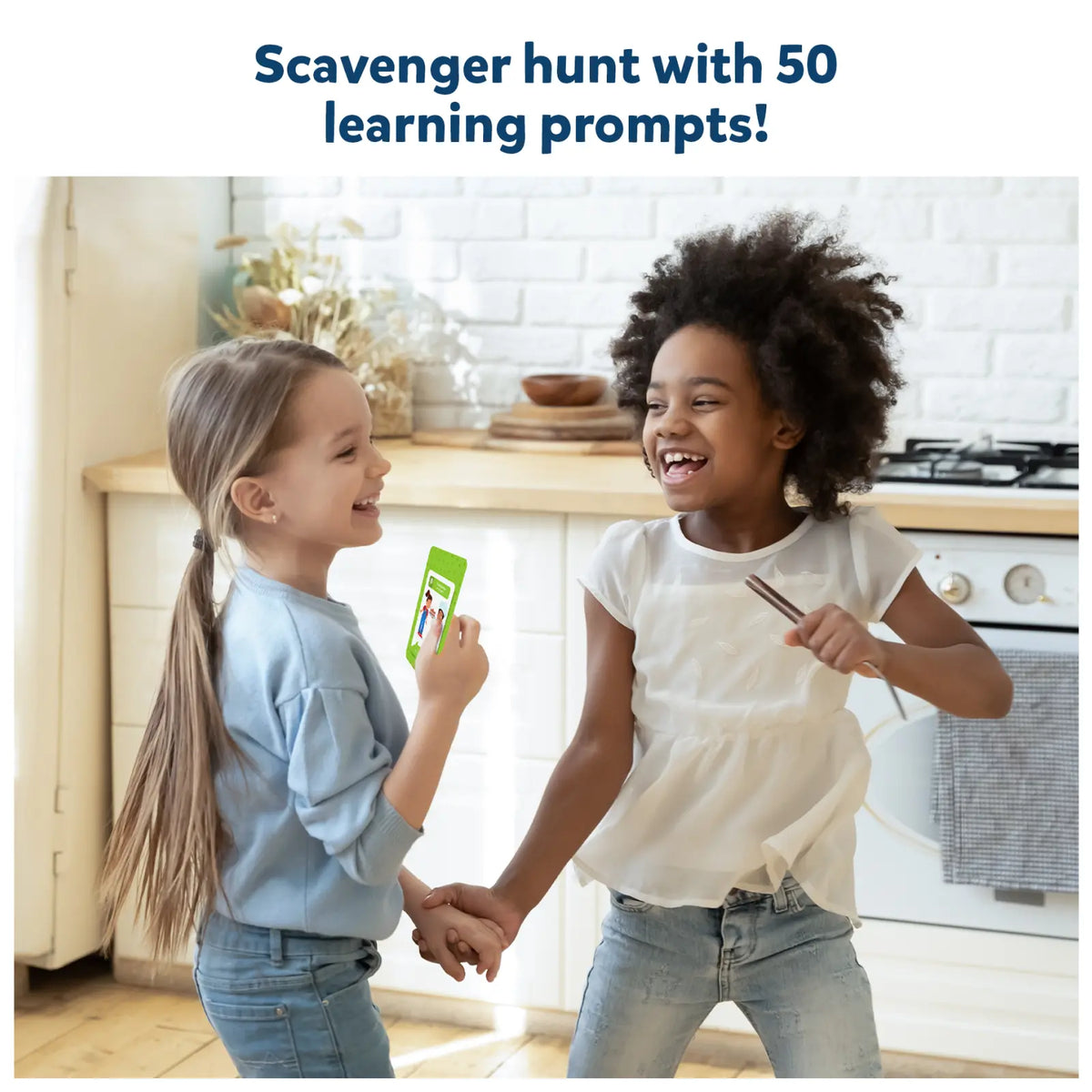 Two young girls enjoying a scavenger hunt game from Found It Indoor Edition