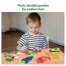 Child playing with fruits and vegetables puzzles from Step by Step Puzzle Fruits & Vegetables