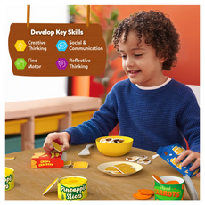 Child playing with pretend grocery food set for kids ages 3 to 7