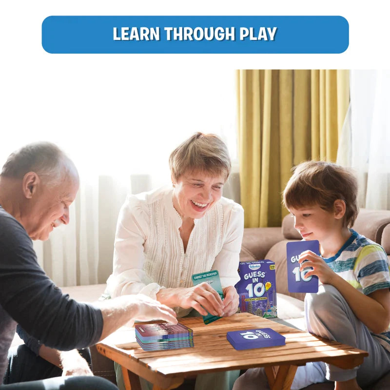 Family playing card game from Legendary Landmarks product on a table outdoors