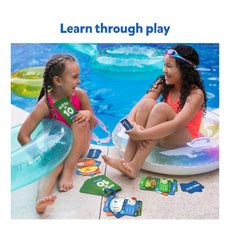 Two girls playing Guess in 10 Splash waterproof trivia card game outdoors