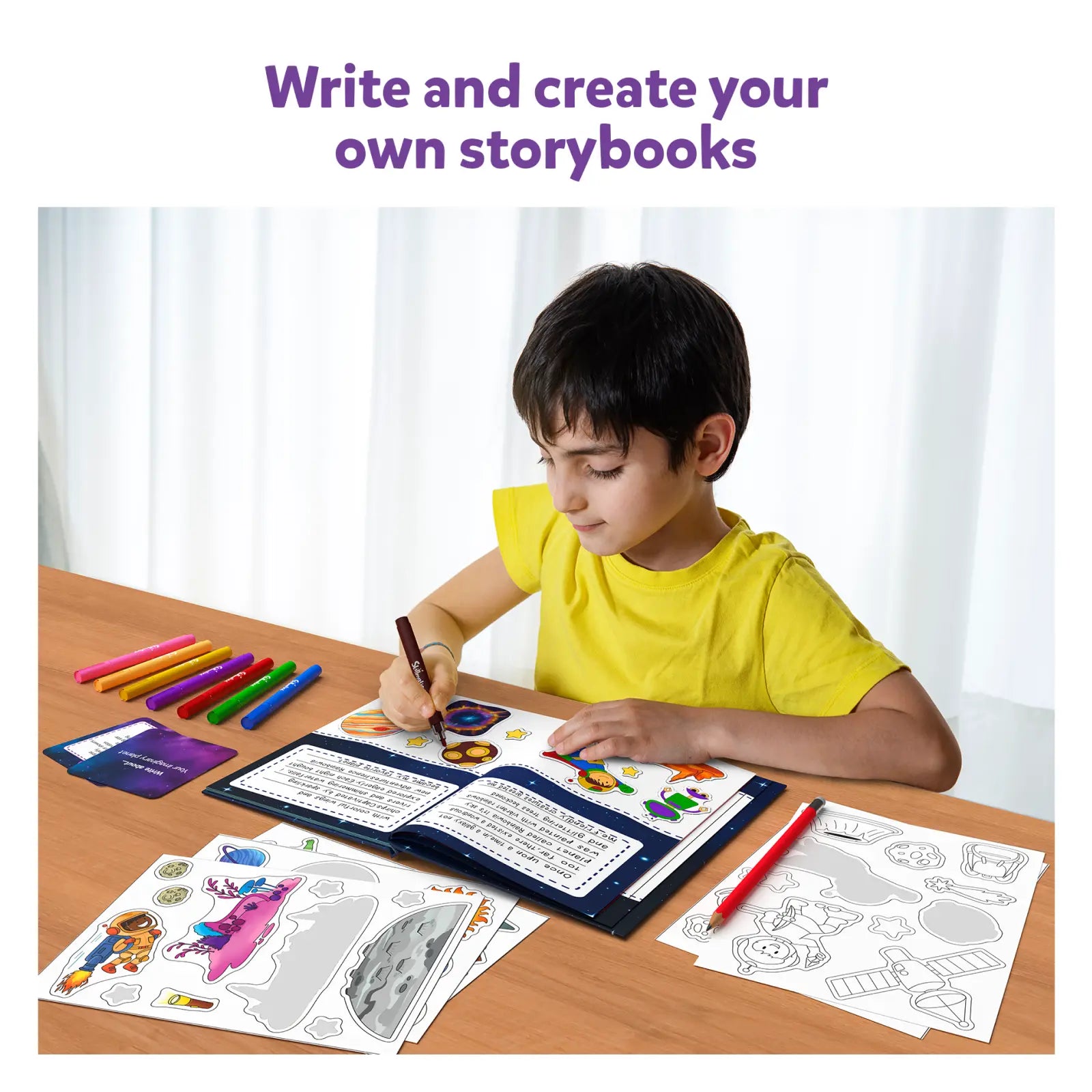 Child creating a space-themed storybook with stickers and markers from My Storybook Art Kit Space Explorers