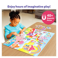 Child playing with a colorful magnetic puzzle on a wooden floor.