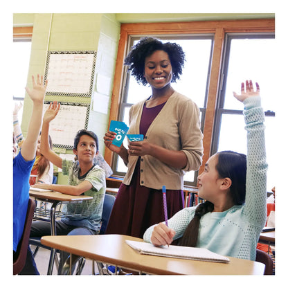 Teacher holding blue cards for Science Snippets Animals and Guess in 10 US History