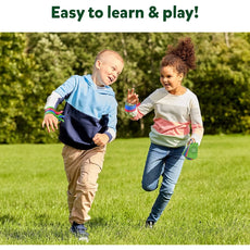 Children playing outdoors with Rapid Rumble Outdoor game in a sunny yard setting